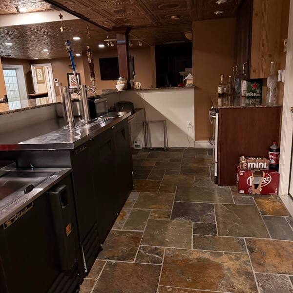 Basement bar area with slate tile floor deep cleaned