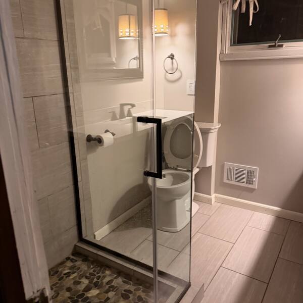 Glass shower and bathroom cleaned to a shine