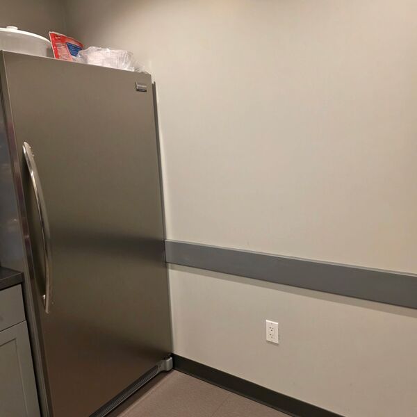 Office breakroom with stainless fridge cleaned