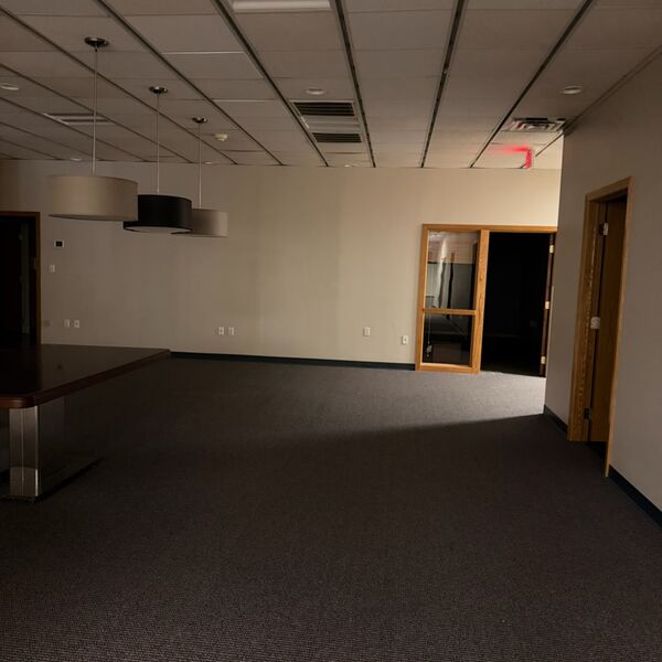 Conference room cleaned with carpet vacuumed