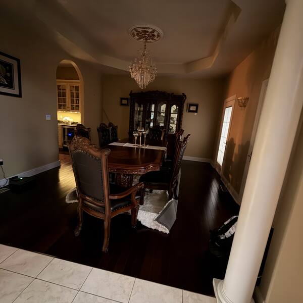 Formal dining room with dark hardwood floor cleaned