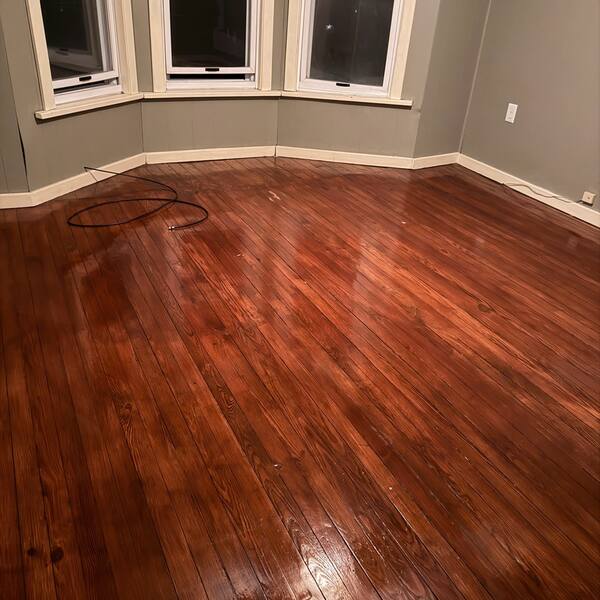 Hardwood floor with bay windows cleaned and polished