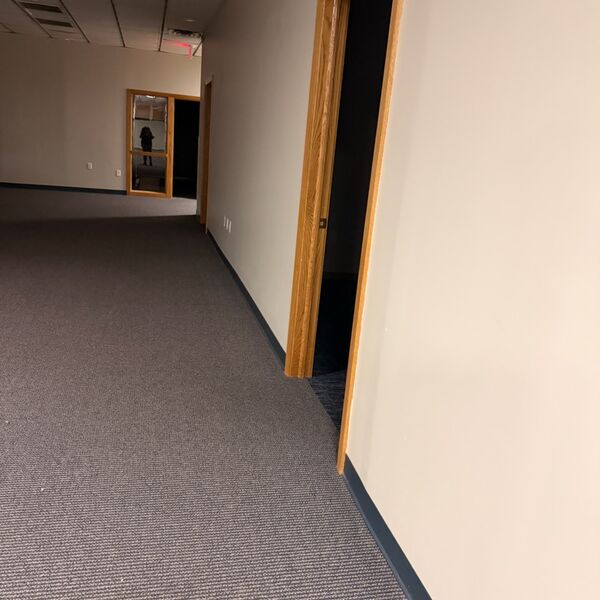 Office suite hallway with carpet freshly cleaned