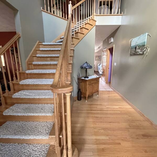 Oak staircase and hardwood foyer cleaned and polished